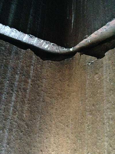 close up of hidden breaches in chimney flue