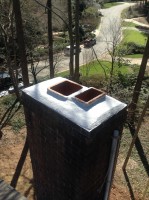 Mr Smokestack Original Photo of Missing Chimney Cap - Broadway and Raleigh, NC Brick chimney with a double flues missing and missing chimney cap
