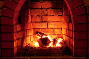 Fire Lit in a Firebox - Raleigh NC - Mr. Smokestack Chimney Service