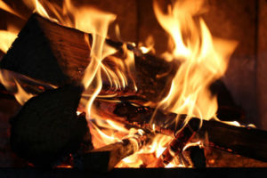 roaring fire in fireplace