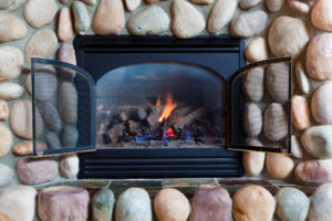 fireplace with doors open