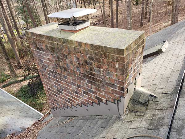 Original Photo- Dirty Chimney Before Power Washing- Mr Smokestack Brick Chimney with dirt and green mold around crown Before Power Washing